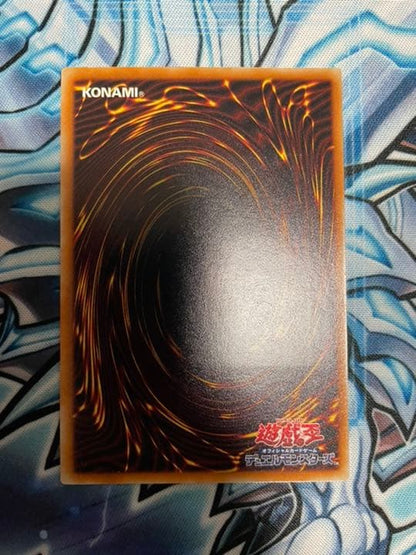 Yugioh Red-Eyes Black Dragon Relief vintage trading card with minor wear, shown in protective sleeve