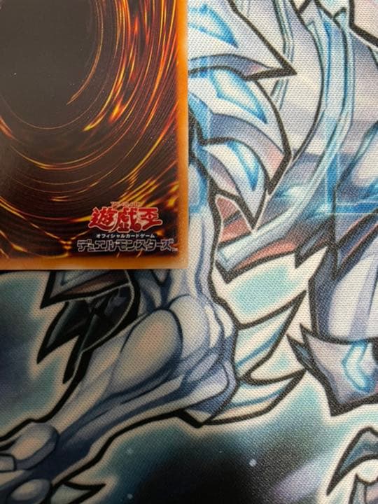 Yugioh Red-Eyes Black Dragon Relief vintage trading card with minor wear, shown in protective sleeve