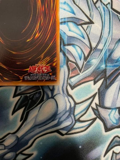 Yugioh Red-Eyes Black Dragon Relief vintage trading card with minor wear, shown in protective sleeve