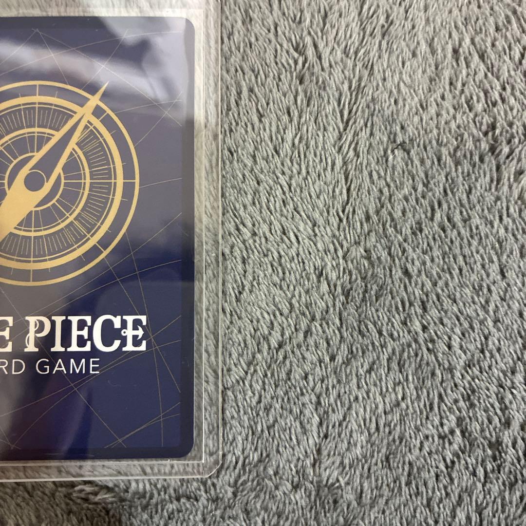 One Piece trading card showing Rosinante and Law parallel version with original anime illustration