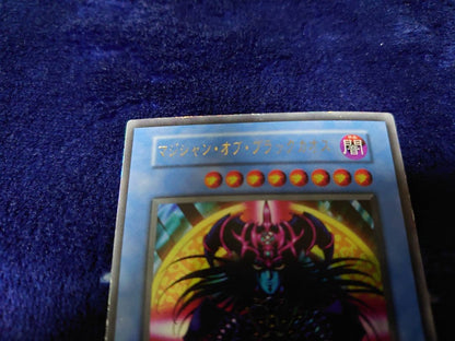 Yu-Gi-Oh! Magician of Black Chaos Japanese card with frame hologram and slight dent on lower back side