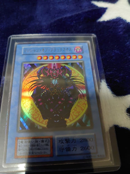 Yu-Gi-Oh! Magician of Black Chaos Japanese card with frame hologram and slight dent on lower back side