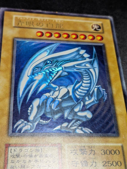 Blue-Eyes White Dragon Yu-Gi-Oh trading card from Initial Set, Japan import, displayed on white background