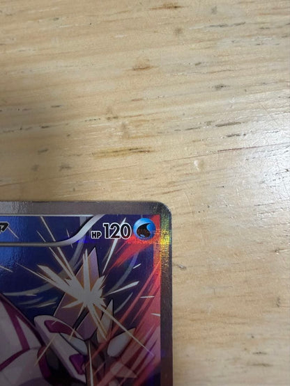 Parukia Pokemon card with 120 HP showing Slash and Cross Slicer moves