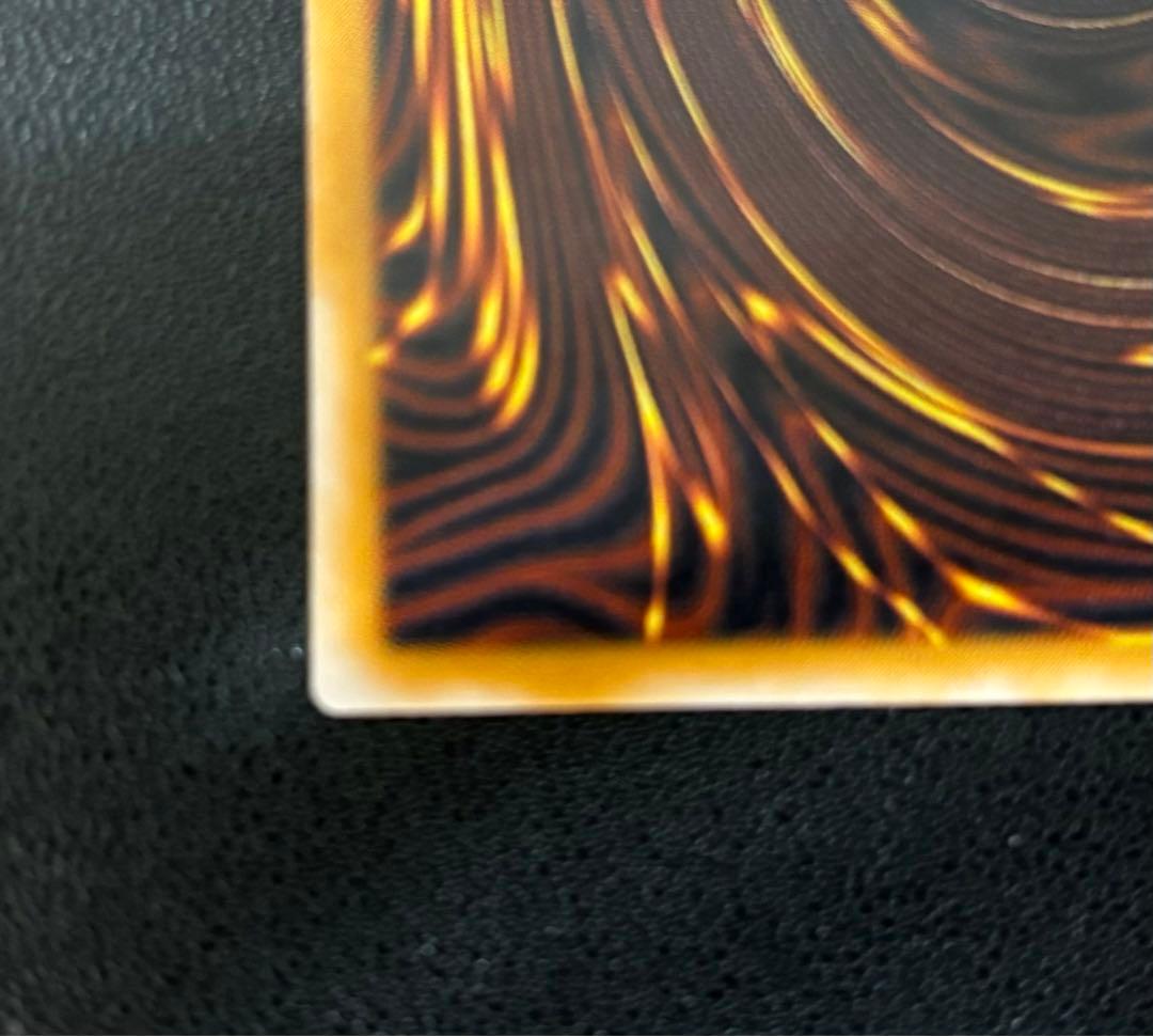 Blue-Eyes White Dragon relief card with 3000 attack power showing slight crease in upper right corner