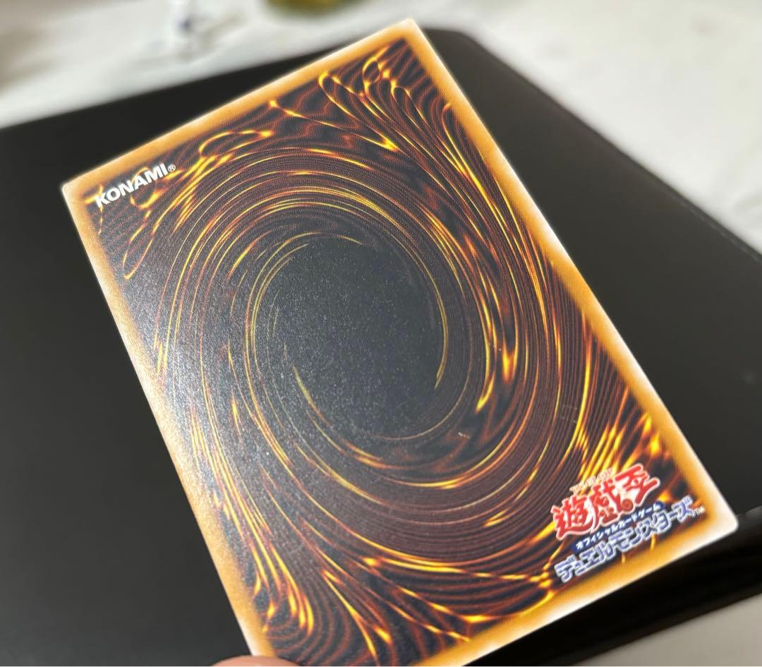 Blue-Eyes White Dragon relief card with 3000 attack power showing slight crease in upper right corner