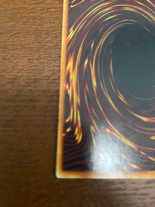 Yu-Gi-Oh Blue-Eyes White Dragon Initial Ultra Rare trading card with minor surface scratches