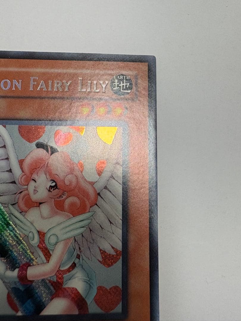 Bandai Yugioh Injection Angel Lily Old Asia Secret 1st edition Yu-Gi-Oh! card with visible back scuffs