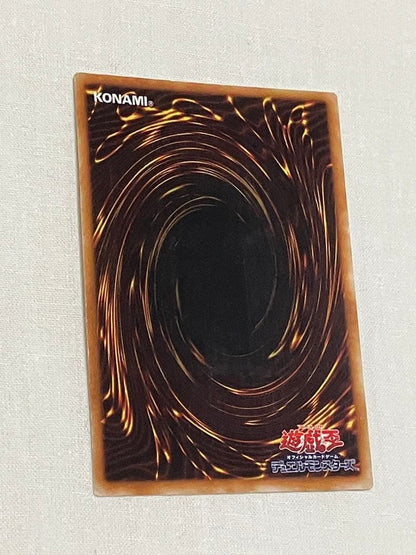 Used Yugioh Revolver Dragon Relief Card from OCG for gameplay shown in varying condition