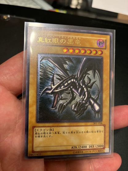 Yu-Gi-Oh Crimson Dark Dragon Relief Ultra Rare 301-056 card showing dark attribute dragon with 2400 attack
