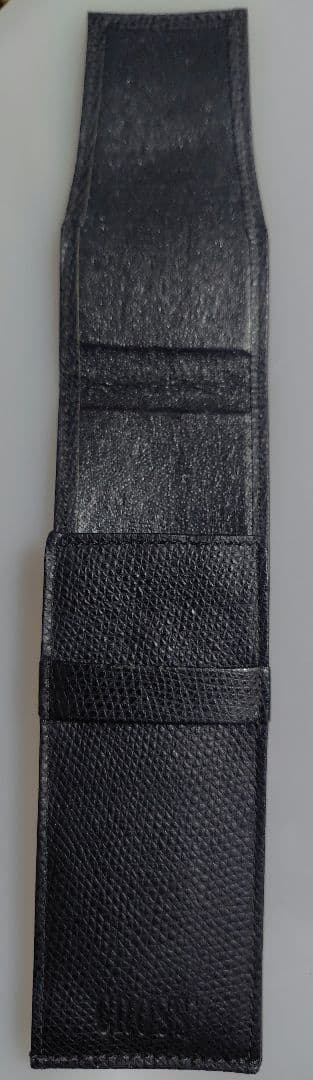 Black genuine leather Cross pen case with flap closure and embossed logo, slim profile business accessory