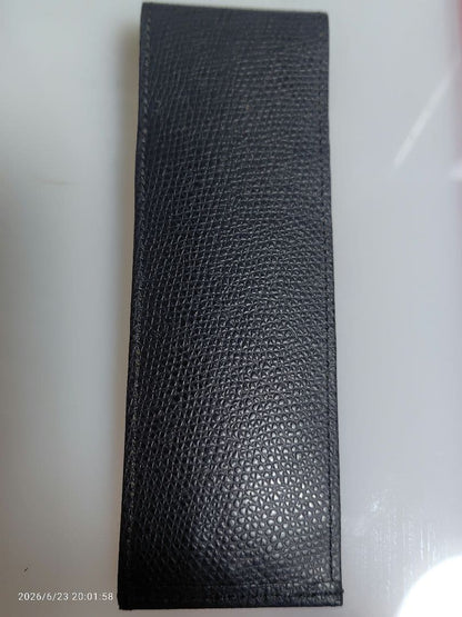 Black genuine leather Cross pen case with flap closure and embossed logo, slim profile business accessory