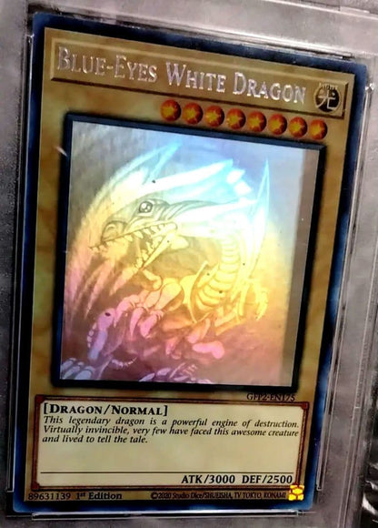 Blue-Eyes White Dragon GFTP English Error Card PSA8 with blacked-out artwork edge and shifted print
