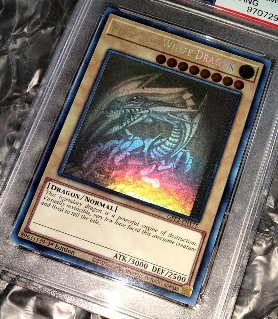 Blue-Eyes White Dragon GFTP English Error Card PSA8 with blacked-out artwork edge and shifted print