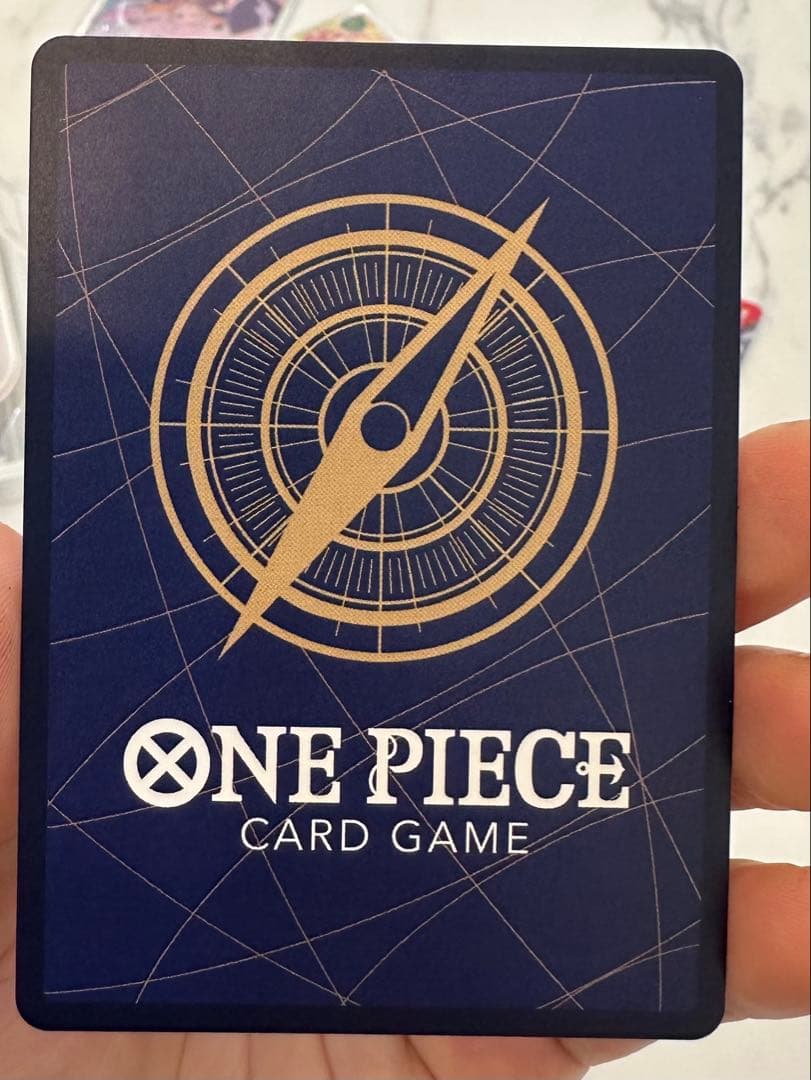 One Piece Monkey D. Luffy OP09-118 secret rare card featuring Gol D. Roger with 13000 power and Slash attribute