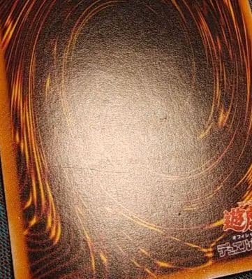 Bandai Chaos Soldier Relief single trading card with dented top and minor scratches shown in sleeve
