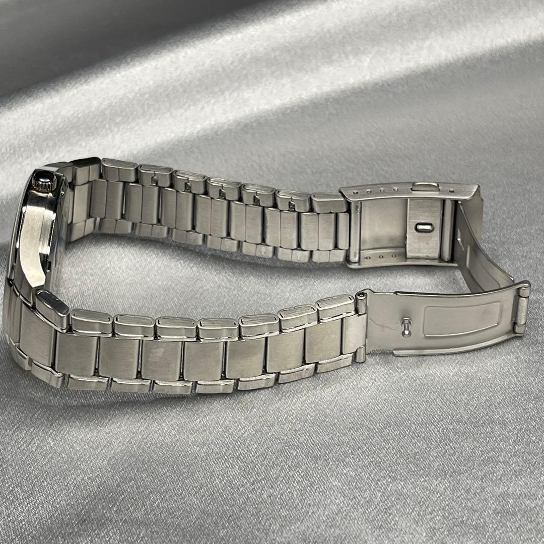 Casio Edifice EF-100 Watch with Silver Band and Brown Dial
