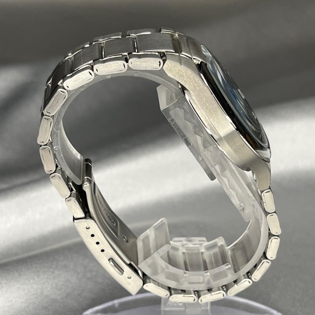 Casio Edifice EF-100 Watch with Silver Band and Brown Dial