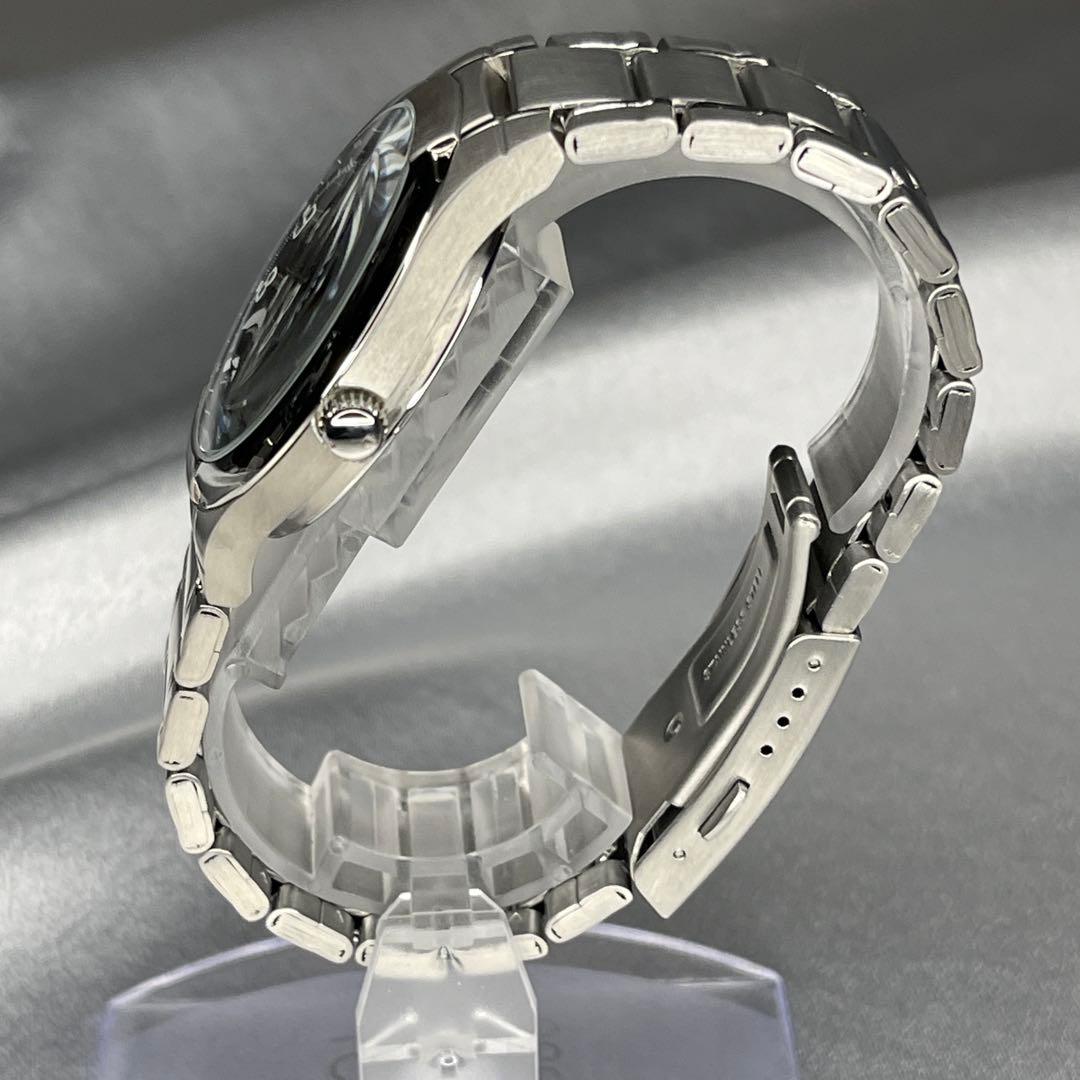Casio Edifice EF-100 Watch with Silver Band and Brown Dial