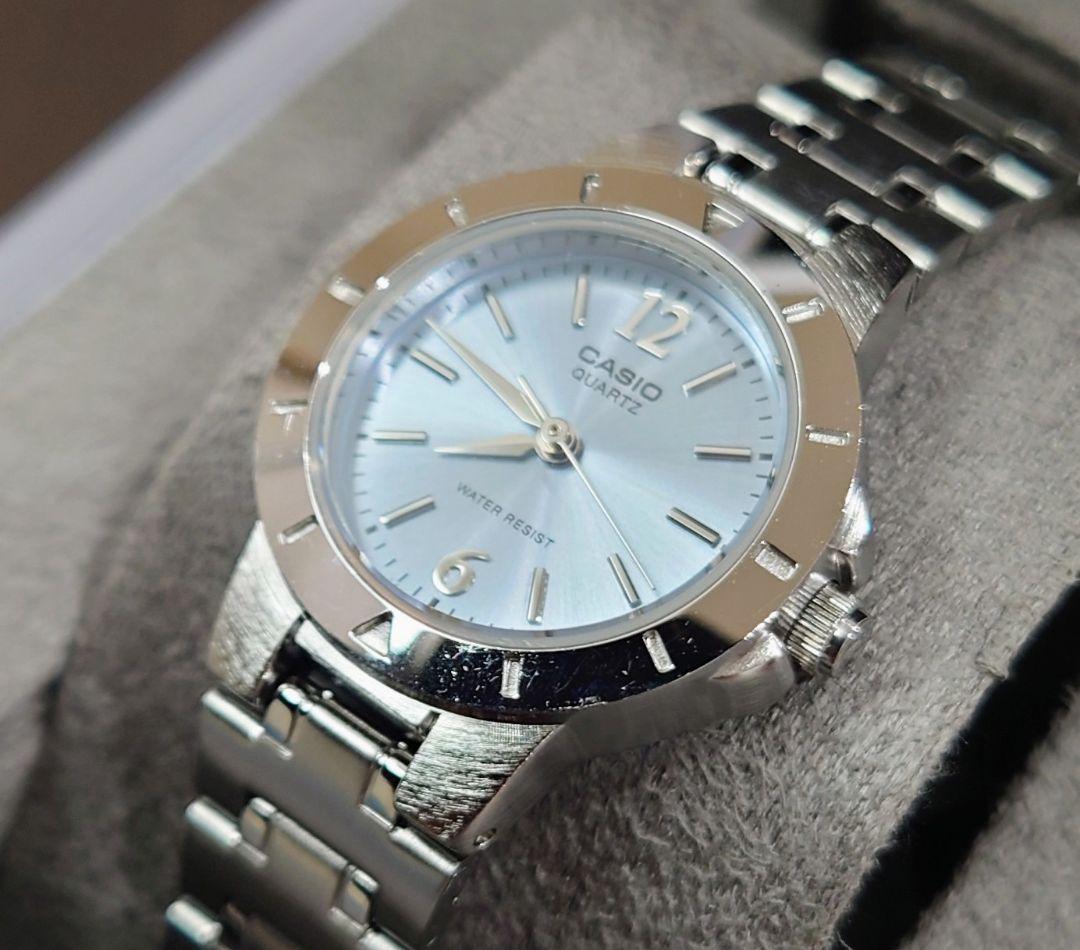 Casio Quartz Wristwatch with Silver Steel Band and Light Blue Dial