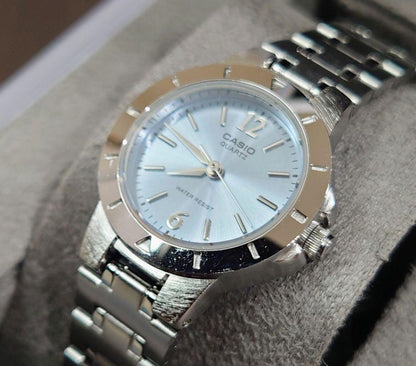 Casio Quartz Wristwatch with Silver Steel Band and Light Blue Dial