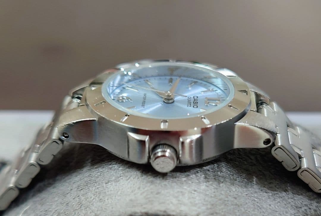 Casio Quartz Wristwatch with Silver Steel Band and Light Blue Dial