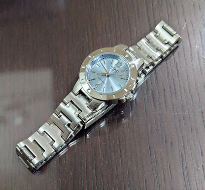 Casio Quartz Wristwatch with Silver Steel Band and Light Blue Dial