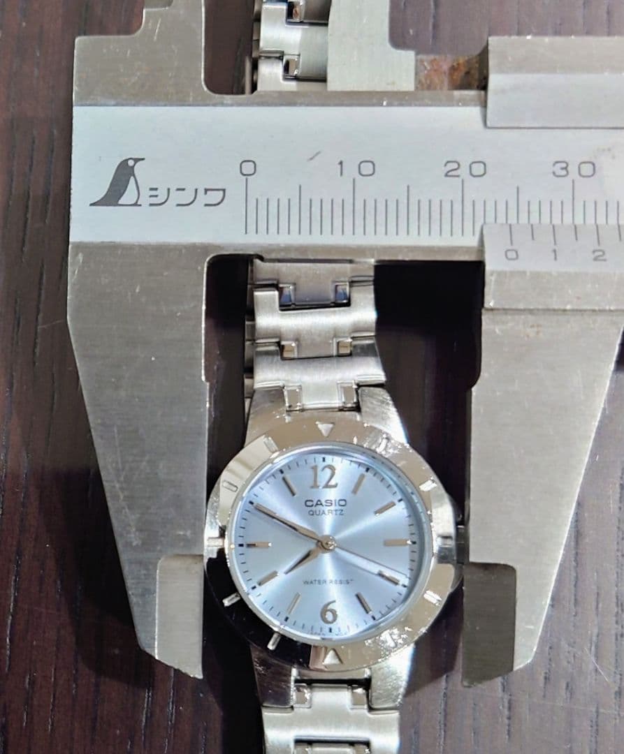 Casio Quartz Wristwatch with Silver Steel Band and Light Blue Dial