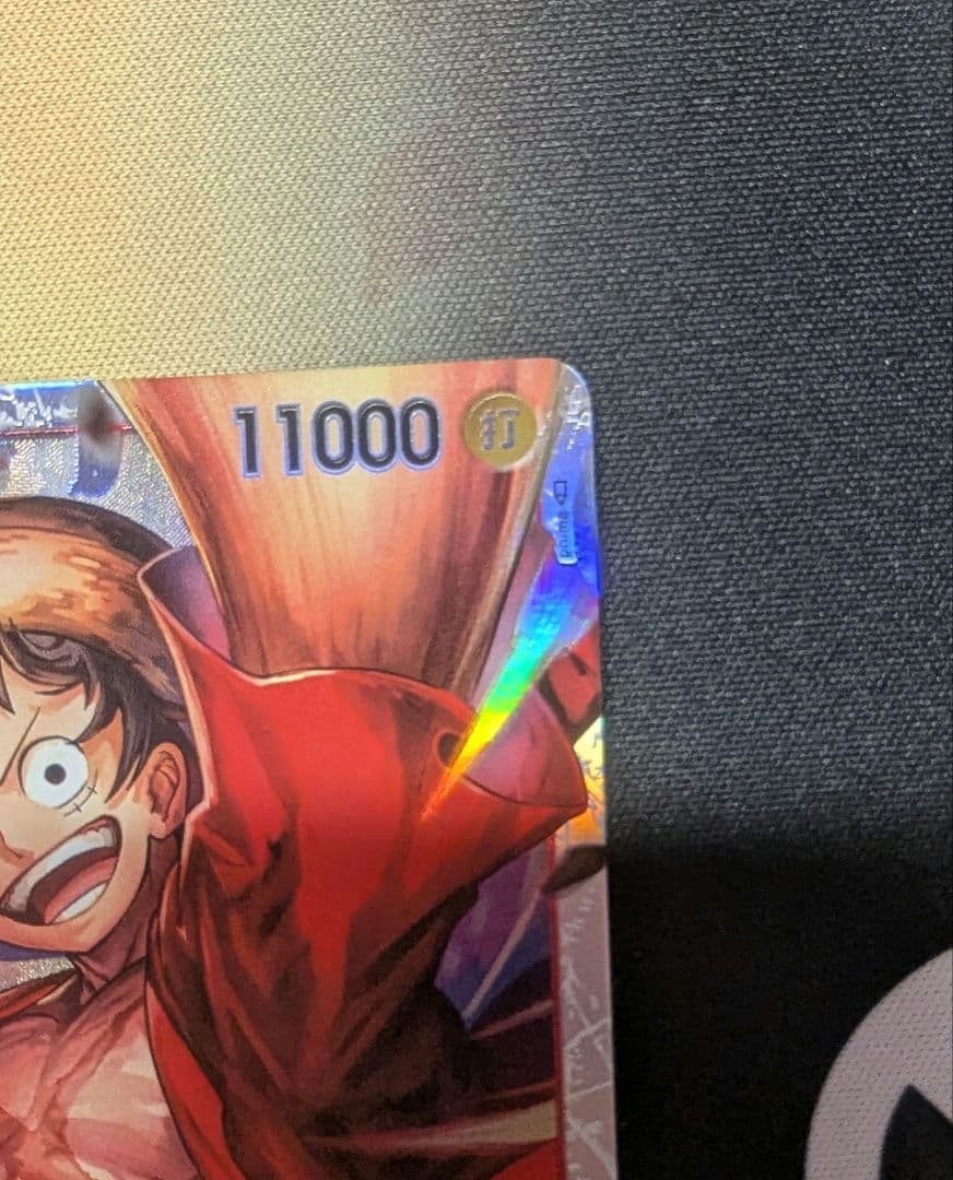 One Piece Monkey D. Luffy OP06 SR Japanese card from Operation Straw Hat series, stored in protective sleeve