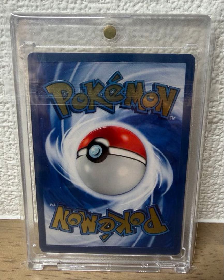 Bandai Pikachu 25th Ultra Premium Metal Collection collectible card with protective inner sleeve and loader
