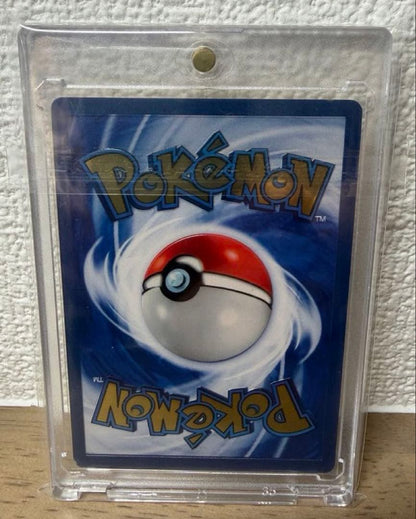 Bandai Pikachu 25th Ultra Premium Metal Collection collectible card with protective inner sleeve and loader