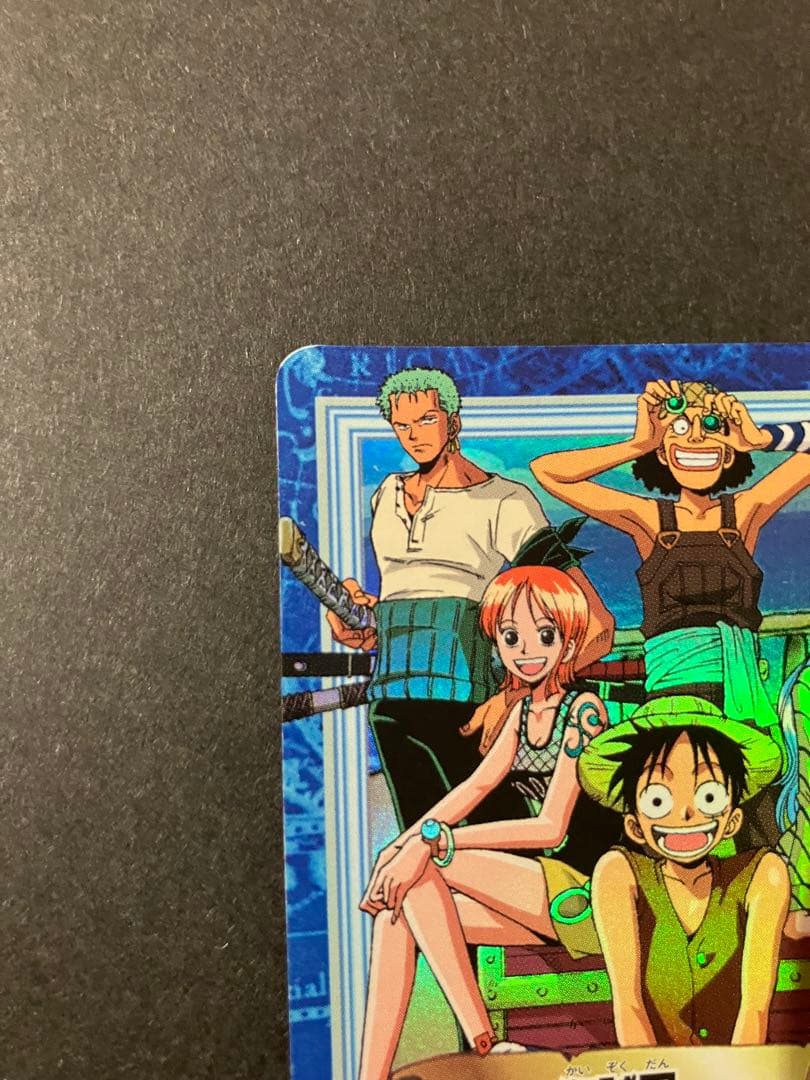 One Piece Monkey D. Luffy Series S82 old Japanese card with scuffs and scratches in protective sleeve