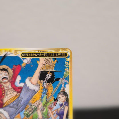 One Piece Monkey D. Luffy Memorial Crew Promo Card PJ-011-WPR with sleeve and cardboard backing
