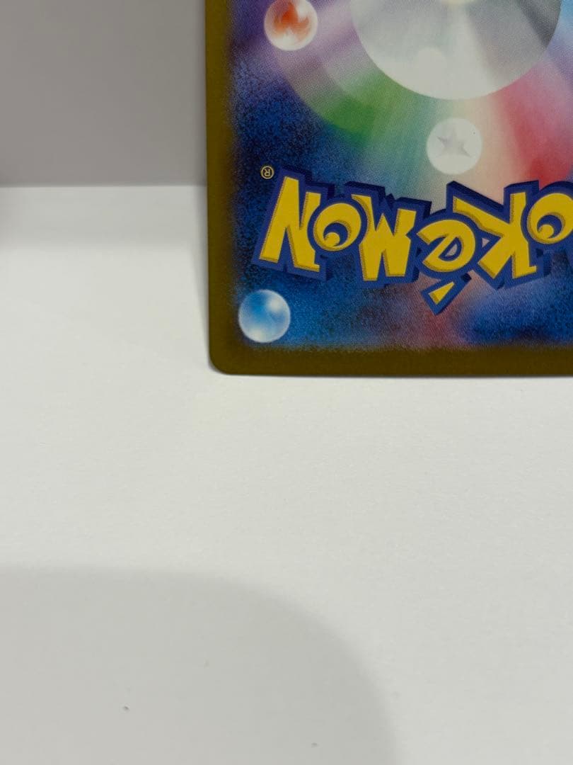 Bandai Pokémon Card Mega Blaziken Lele's Decision SAR with sleeve, magnet loader, and card stand