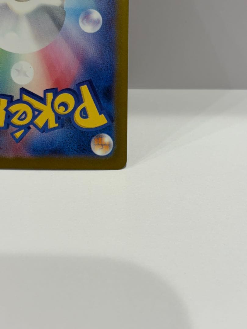 Bandai Pokémon Card Mega Blaziken Lele's Decision SAR with sleeve, magnet loader, and card stand