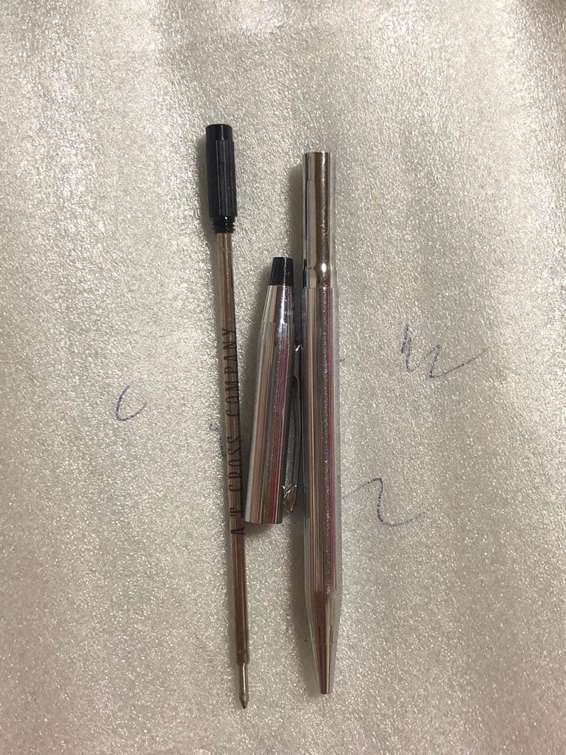 Casio Cross Pen with sleek design and smooth writing tip shown on white background