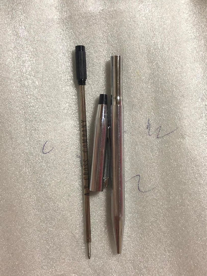 Casio Cross Pen with sleek design and smooth writing tip shown on white background