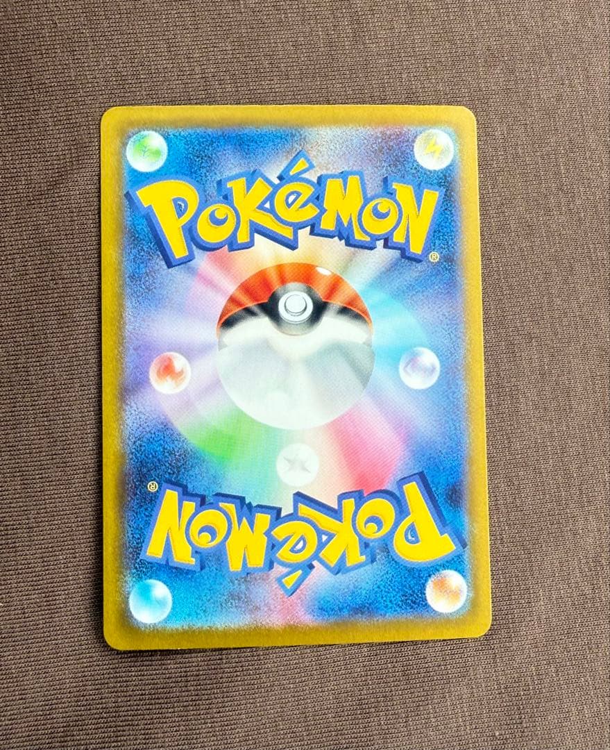 Mega Charizard X ex SAR Pokemon card with Fire type and 360 HP, displayed in protective sleeve