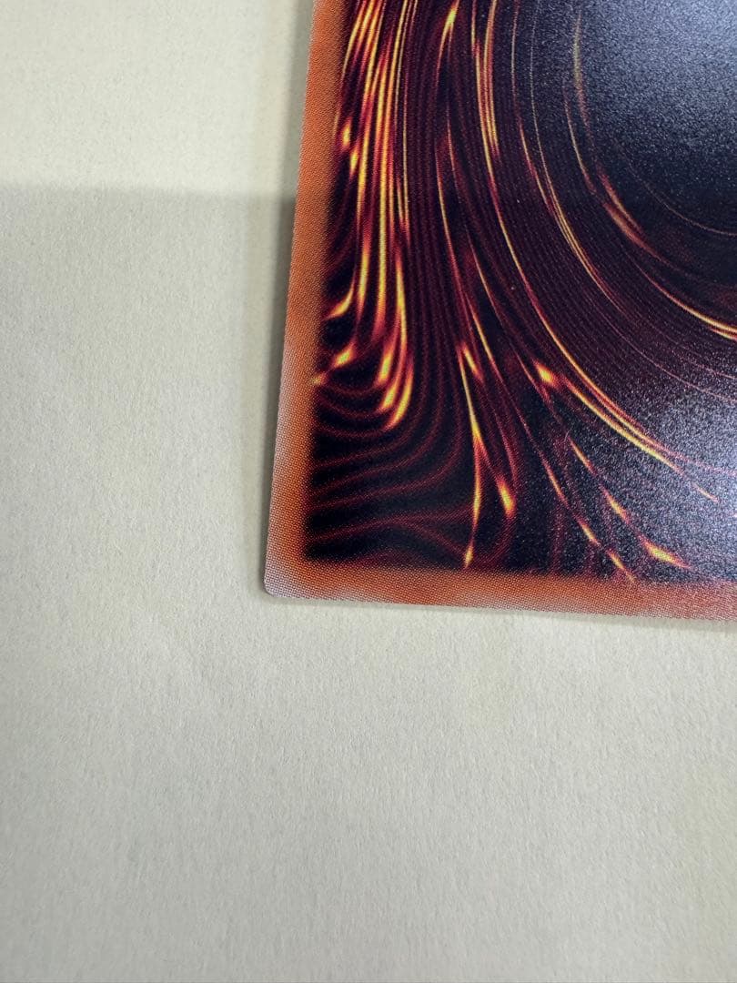 Yu-Gi-Oh Black Rose Dragon 20th Secret Rare card with visible surface mark near center