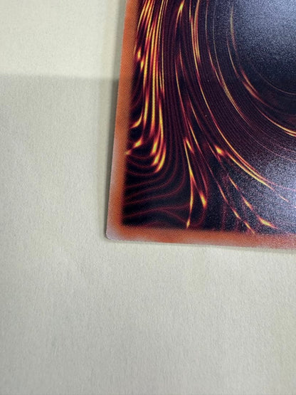 Yu-Gi-Oh Black Rose Dragon 20th Secret Rare card with visible surface mark near center