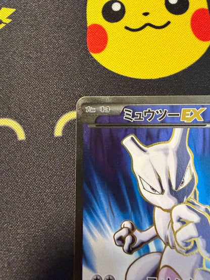 Mewtwo EX SR XY8 Blue Impact trading card number 062/059 with clean front and minor back scratches