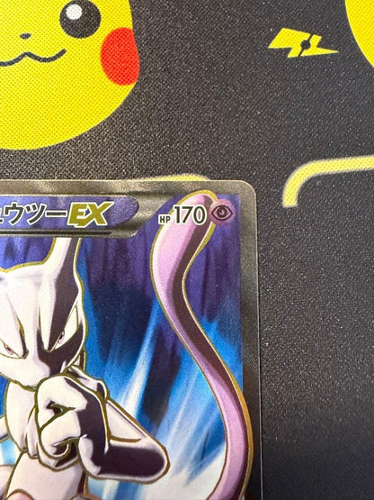 Mewtwo EX SR XY8 Blue Impact trading card number 062/059 with clean front and minor back scratches
