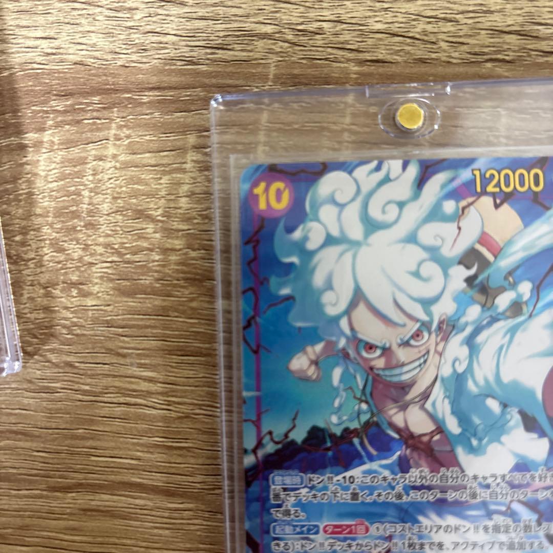 One Piece Monkey D. Luffy OP05-119 SEC Parallel Japanese trading card in protective hard case and sleeve