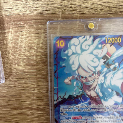 One Piece Monkey D. Luffy OP05-119 SEC Parallel Japanese trading card in protective hard case and sleeve