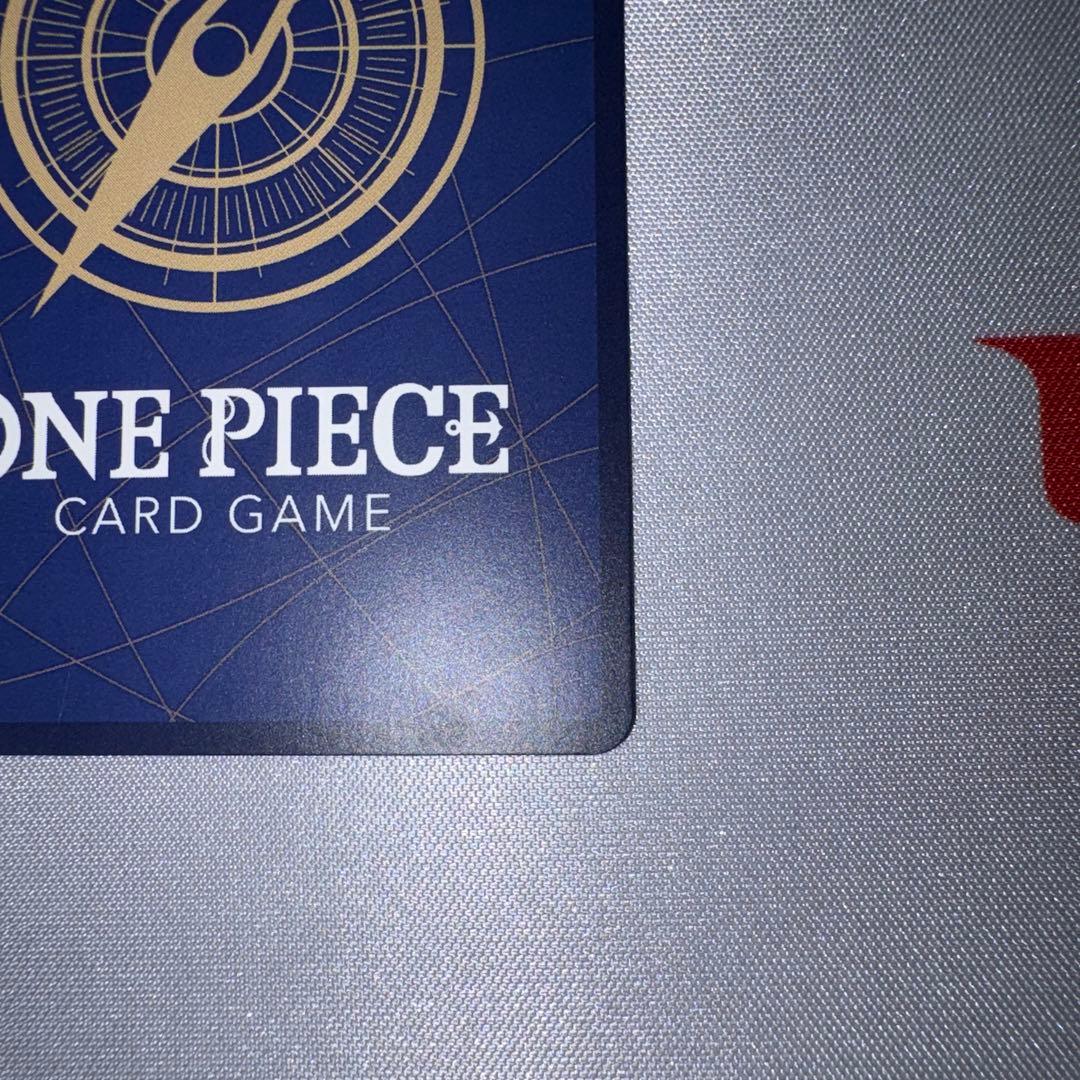 Monkey D. Luffy One Piece promotional card from Mos Burger collaboration stored in sleeve and coin case