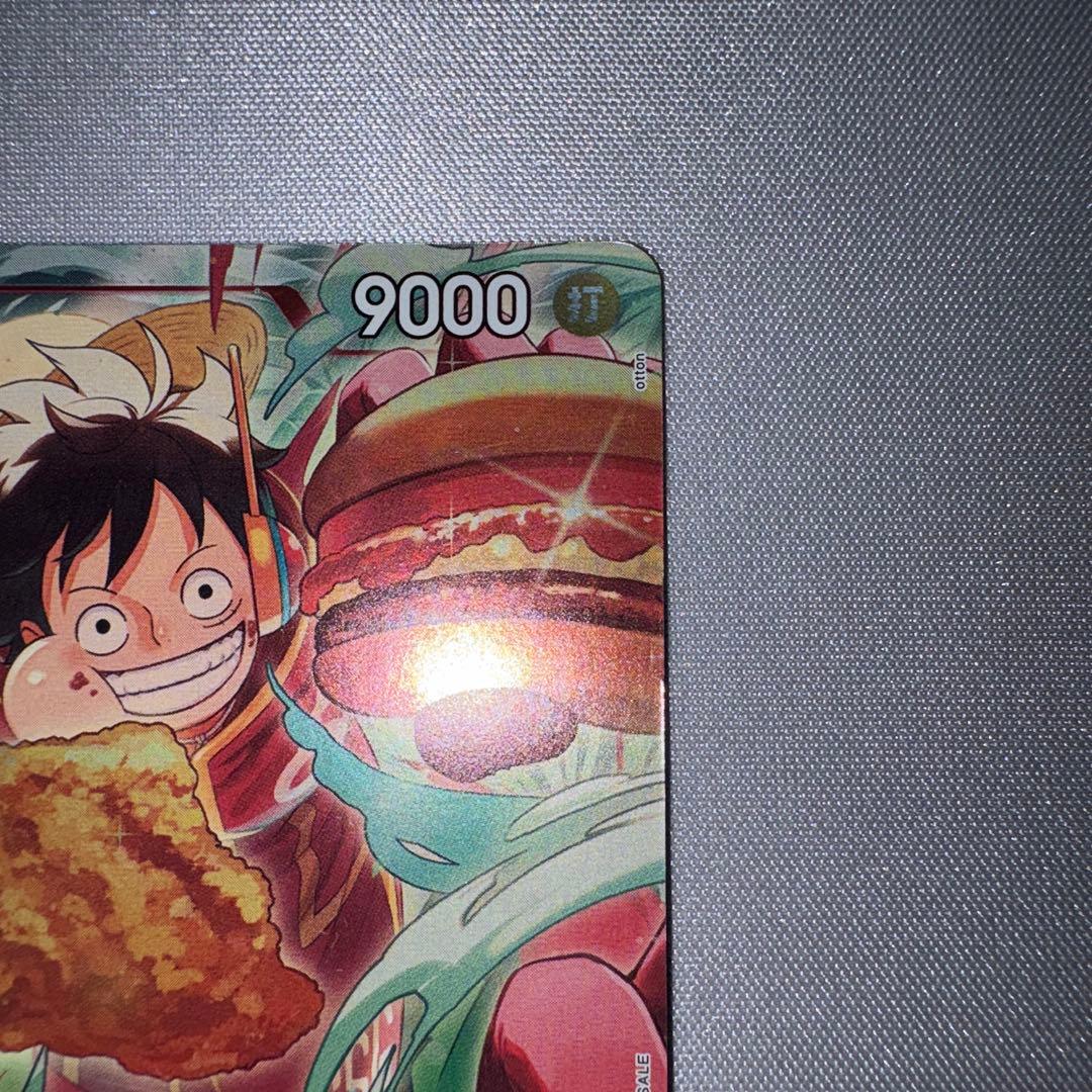 Monkey D. Luffy One Piece promotional card from Mos Burger collaboration stored in sleeve and coin case