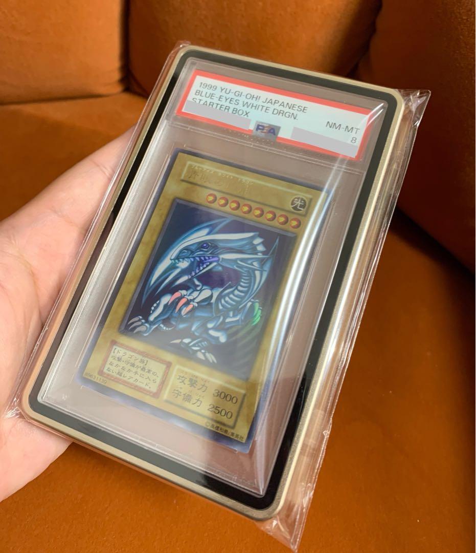 Blue-Eyes White Dragon Ultra Rare Initial Edition Yu-Gi-Oh trading card graded PSA8 in protective case