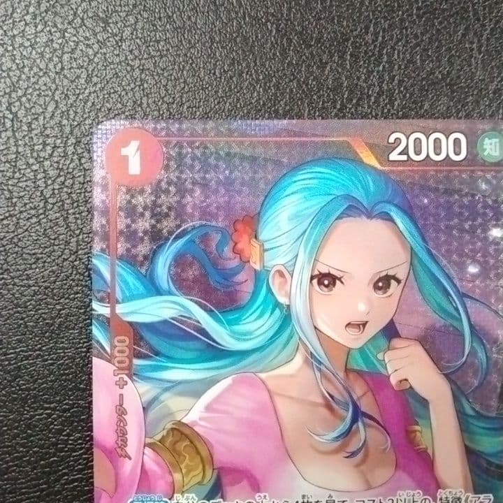 One Piece Nefertari Vivi promotion card stored in protective double sleeves from Japan import