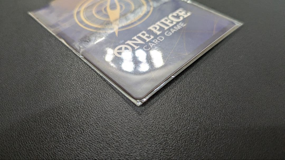 One unopened One Piece Melomelo Sweet Breeze parallel card ST03-017 with slight scratch above Melomelo's mouth