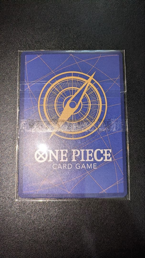 One unopened One Piece Melomelo Sweet Breeze parallel card ST03-017 with slight scratch above Melomelo's mouth